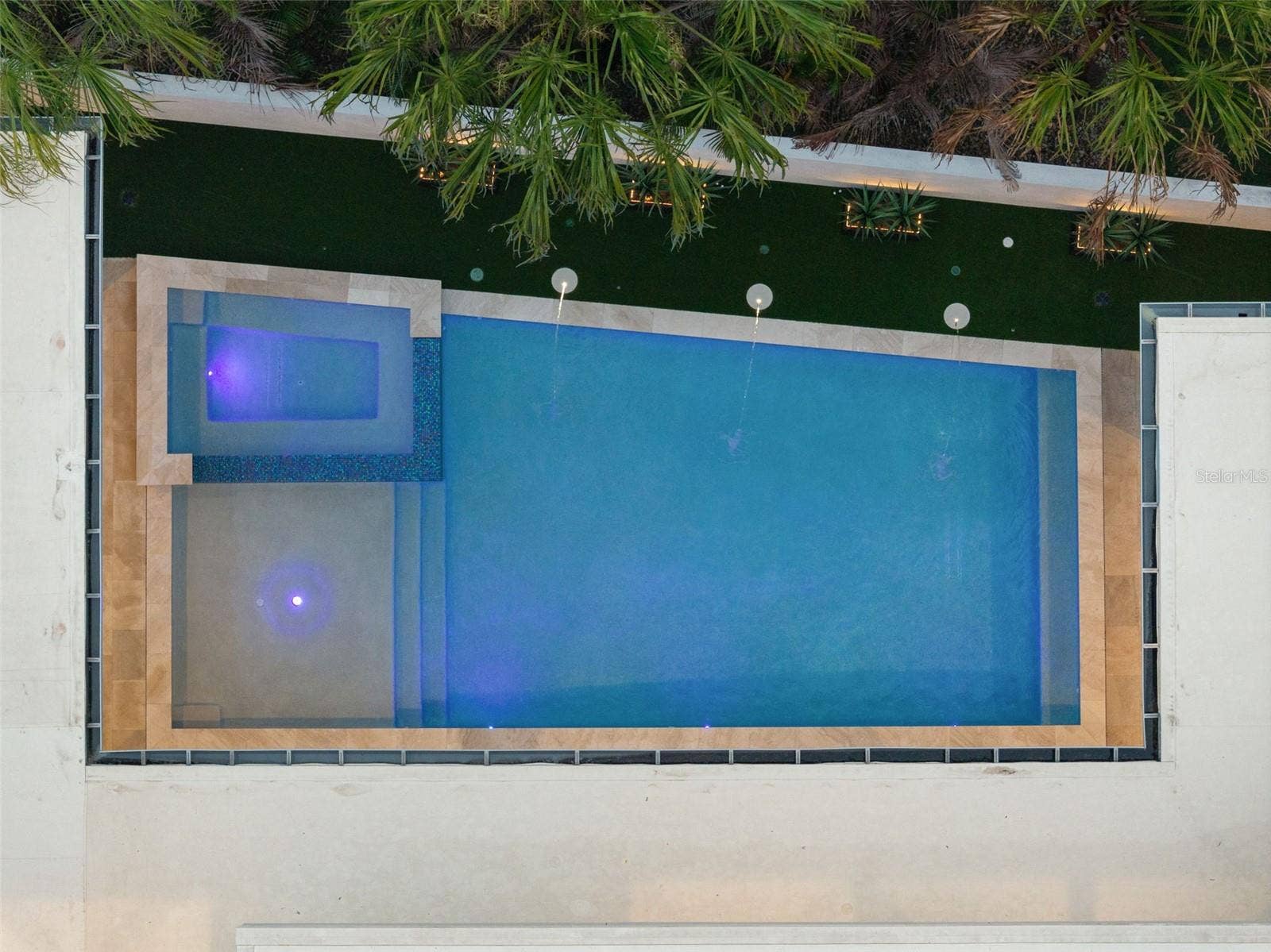 8643 FARTHINGTON WAY, Orlando, FL 32827 Pool Aerial at Dusk