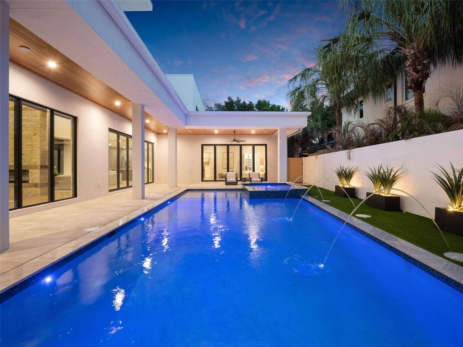 8643 FARTHINGTON WAY, Orlando, FL 32827 Pool & Spa at Dusk