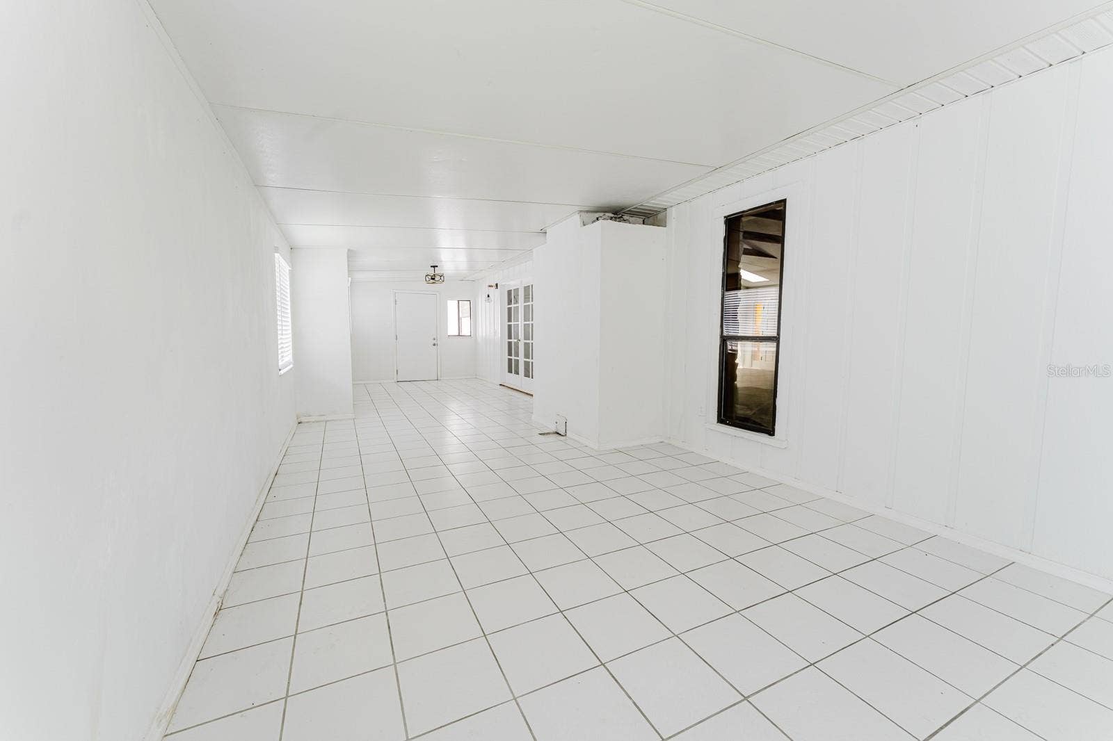 96 E BAYSHORE DRIVE, Port Orange, FL 32127 Back Enclosed Porch