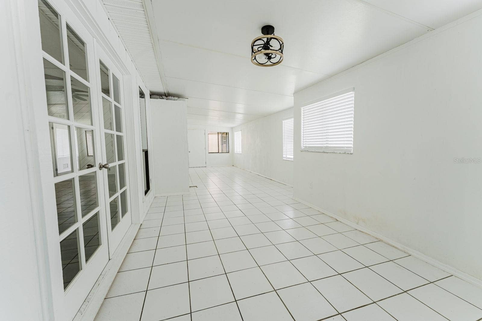 96 E BAYSHORE DRIVE, Port Orange, FL 32127 Back Enclosed Porch