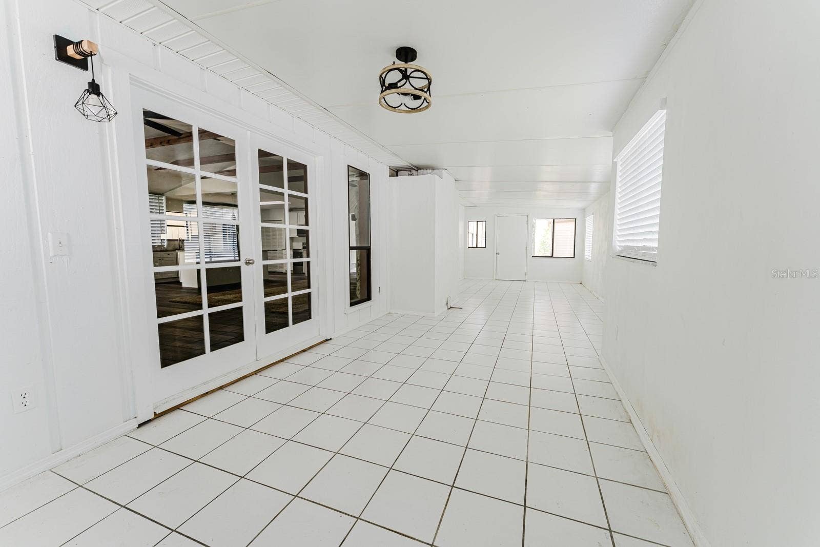 96 E BAYSHORE DRIVE, Port Orange, FL 32127 Back Enclosed Porch