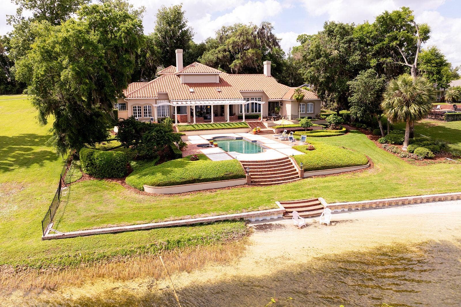 1351 N CLASSIC COURT, Longwood, FL 32779 Spectacular grounds and luxury home, and this can all be yours. You can even build a sandcastle on your private beach.