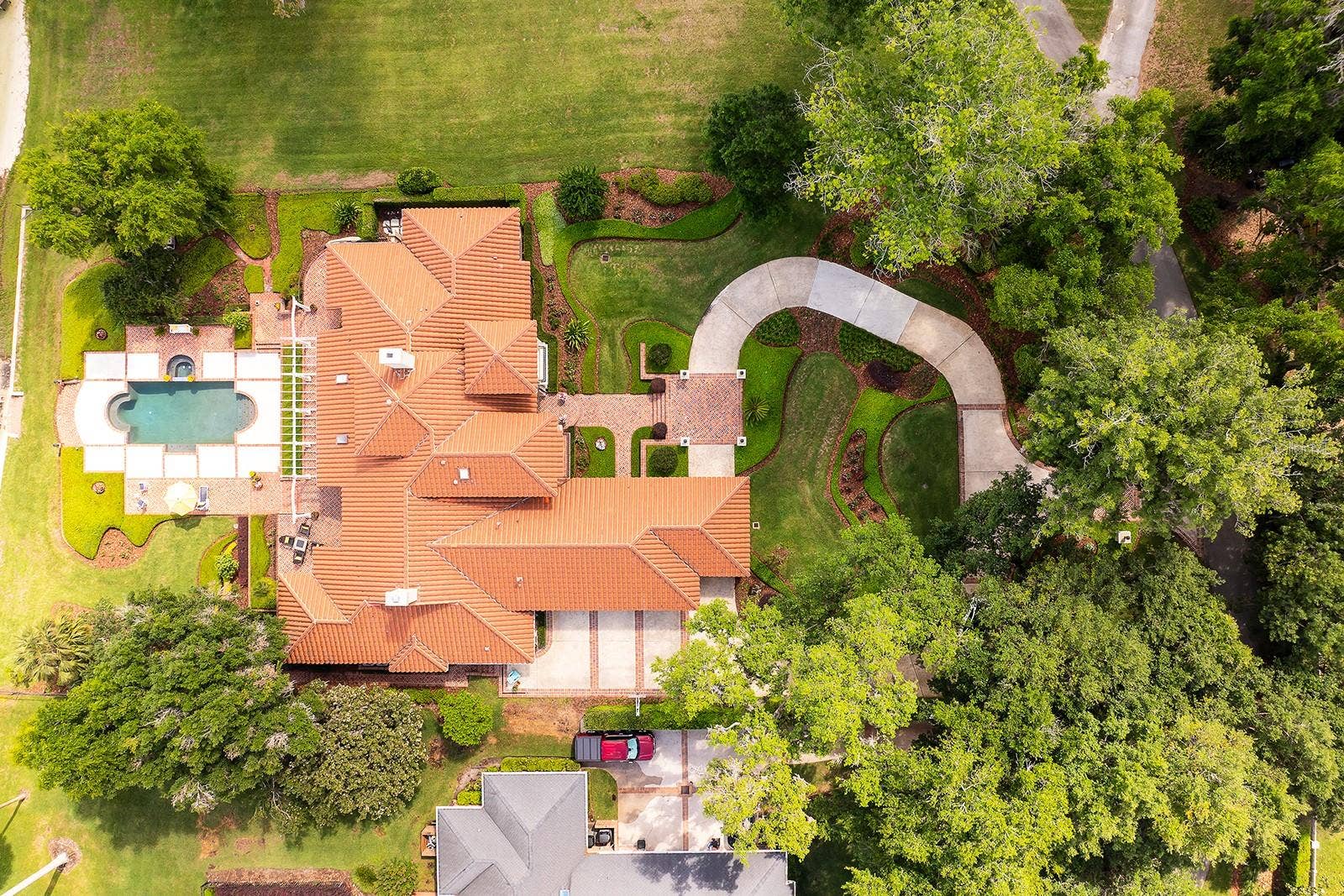 1351 N CLASSIC COURT, Longwood, FL 32779 This estate is a custom-designed masterpiece crafted by a renowned local architectural firm.