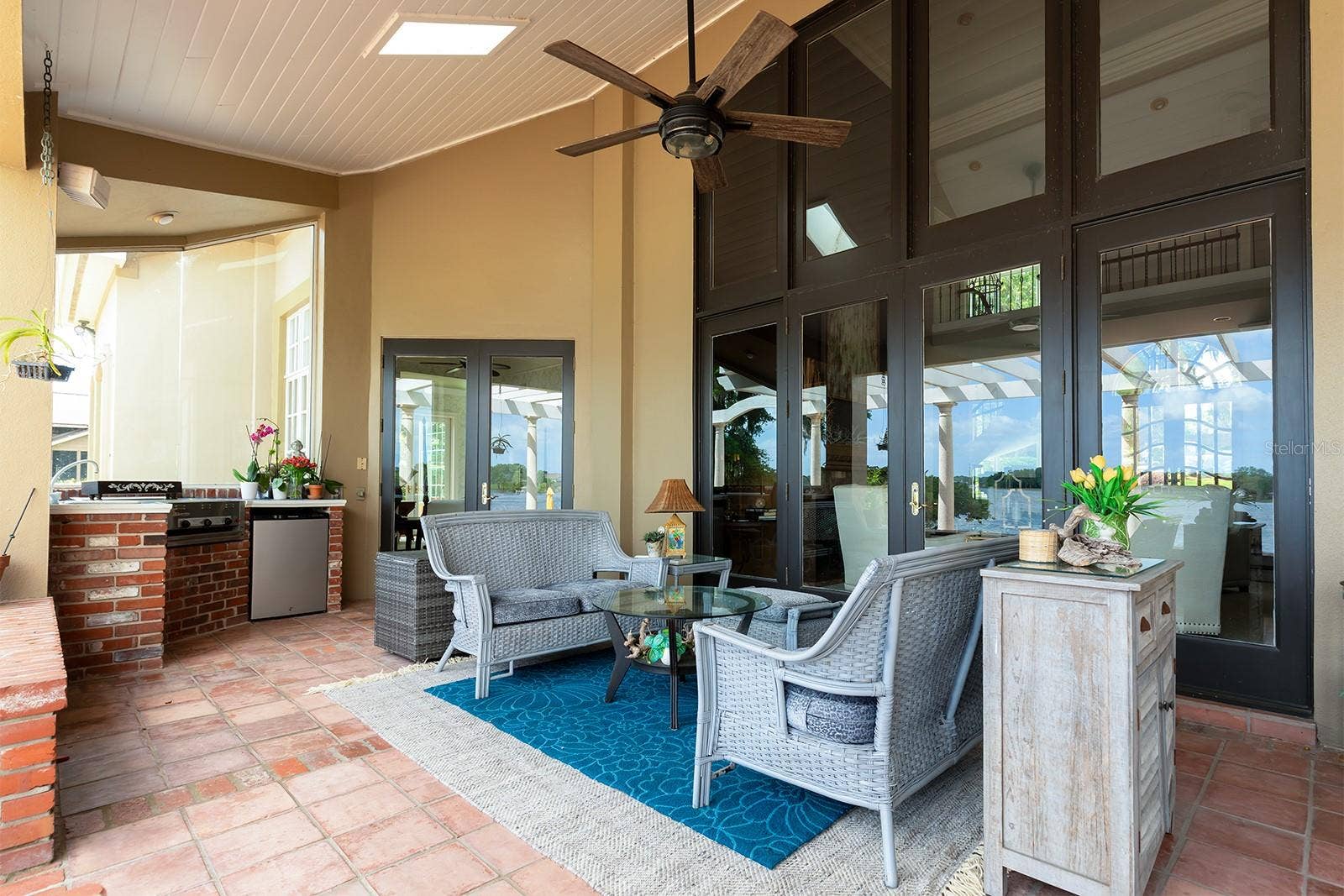 1351 N CLASSIC COURT, Longwood, FL 32779 OUTDOOR grill and cooking area with covered porch and skylights.