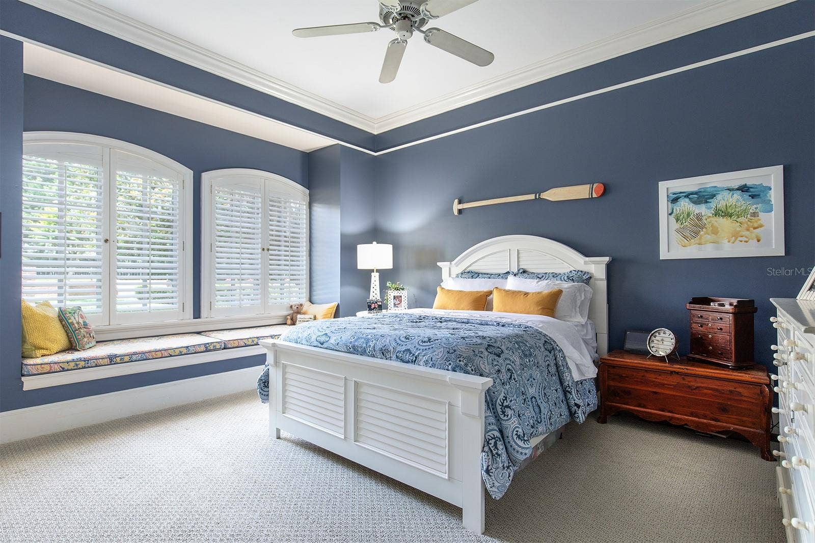 1351 N CLASSIC COURT, Longwood, FL 32779 One of the many beautifully designed bedrooms, with lots of light, plantation shutters and even a window seat to enjoy the grounds.
