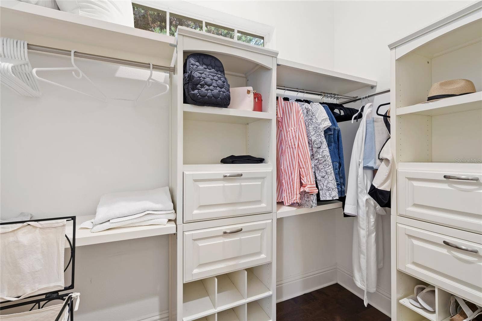 11051 HAWKSHEAD COURT, Windermere, FL 34786 1 of 2 walk in closets in Primary Suite with custom closet system