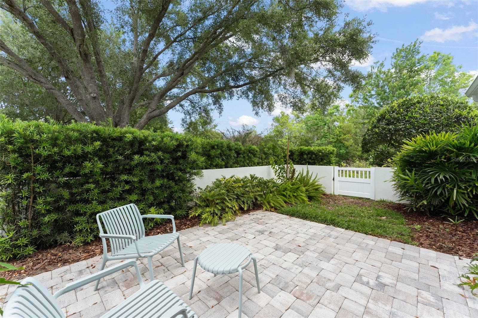 13542 SUNSET LAKES CIRCLE, Winter Garden, FL 34787 Courtyard outside gym