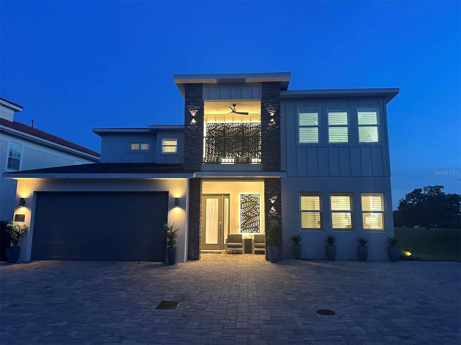 7442 GATHERING COURT, Kissimmee, FL 34747 Front Elevation at Sun Setting