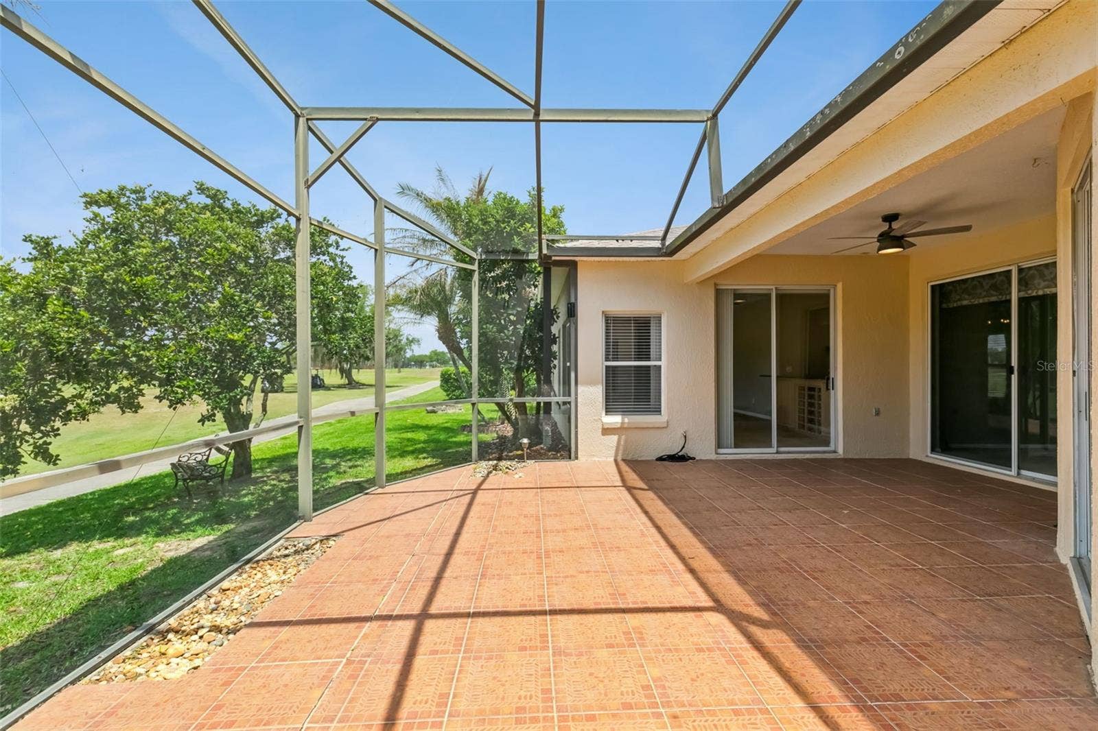 237 STRATHMORE CIRCLE, Kissimmee, FL 34744 Plenty of room for plants, a hot tub, or dining table.
