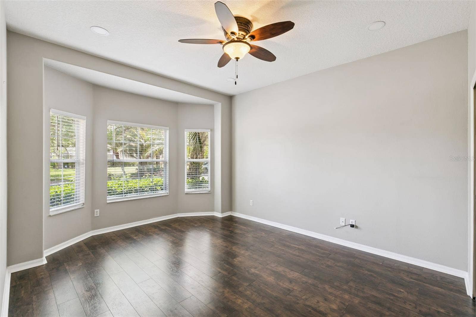 237 STRATHMORE CIRCLE, Kissimmee, FL 34744 First bedroom on the left with bay window.