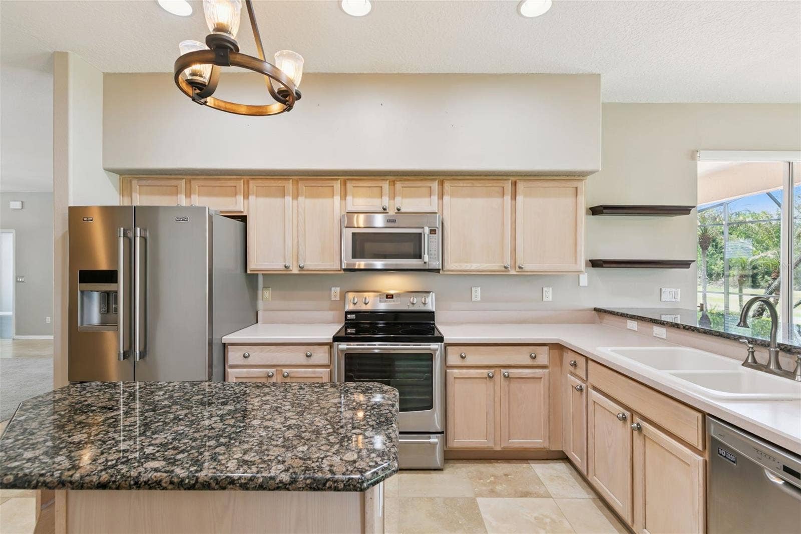 237 STRATHMORE CIRCLE, Kissimmee, FL 34744 Plenty of space for meal prep.