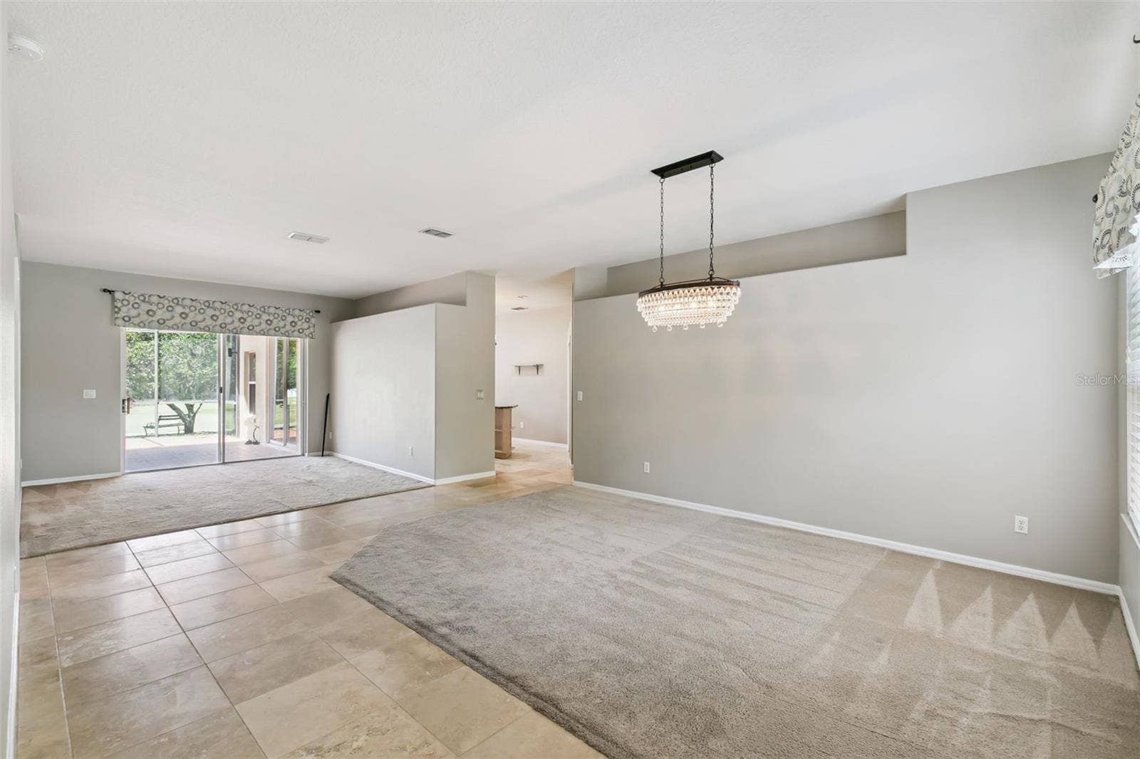 237 STRATHMORE CIRCLE, Kissimmee, FL 34744 Large front rooms with lots of light.