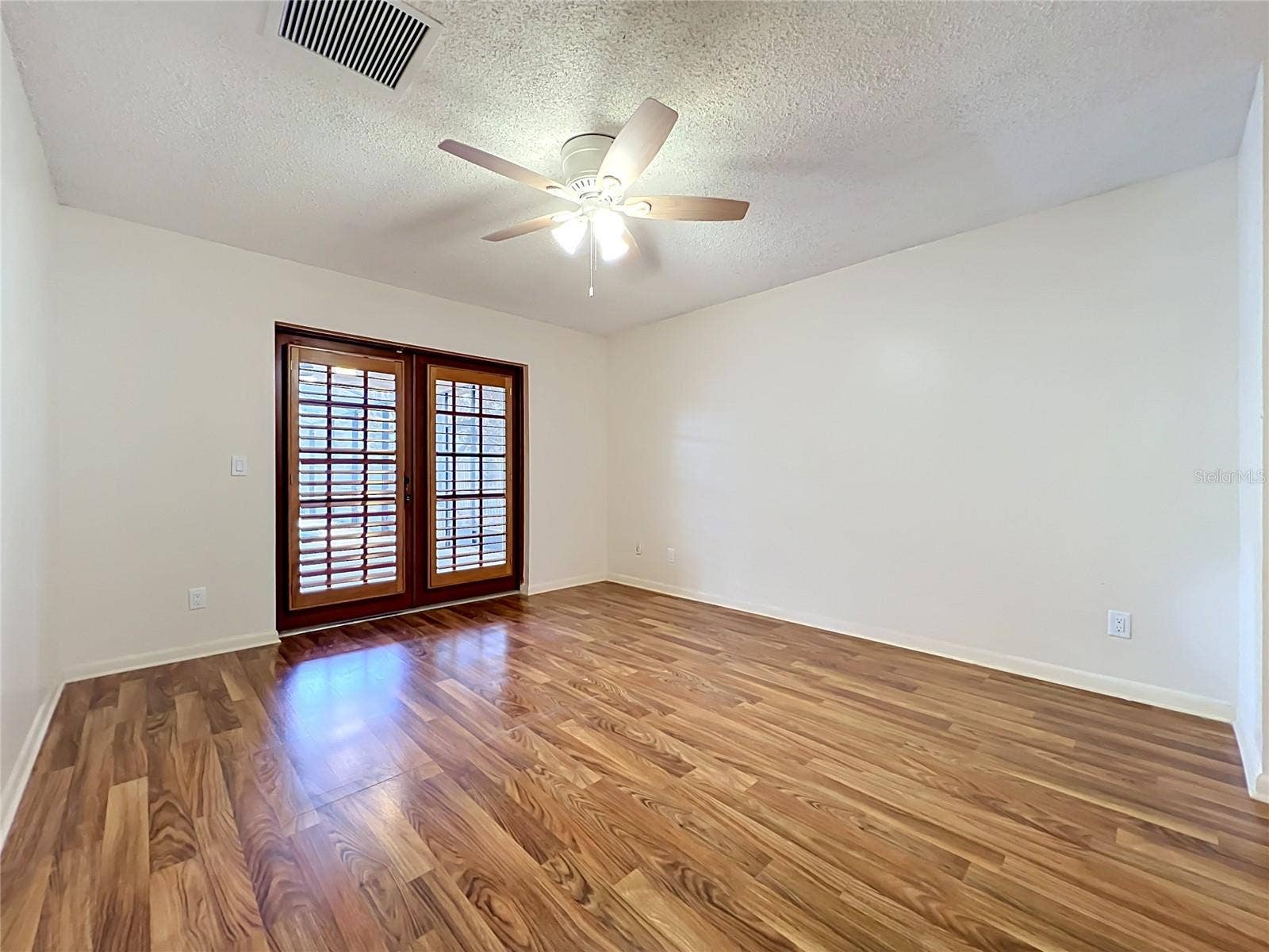 105 CEDAR OAK TRAIL, Longwood, FL 32750 Primary Suite with french doors to lanai