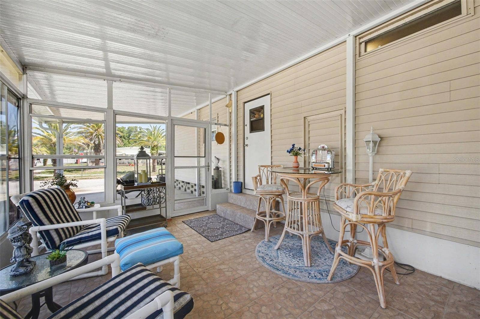 Enjoy sitting in the enclosed screen patio.