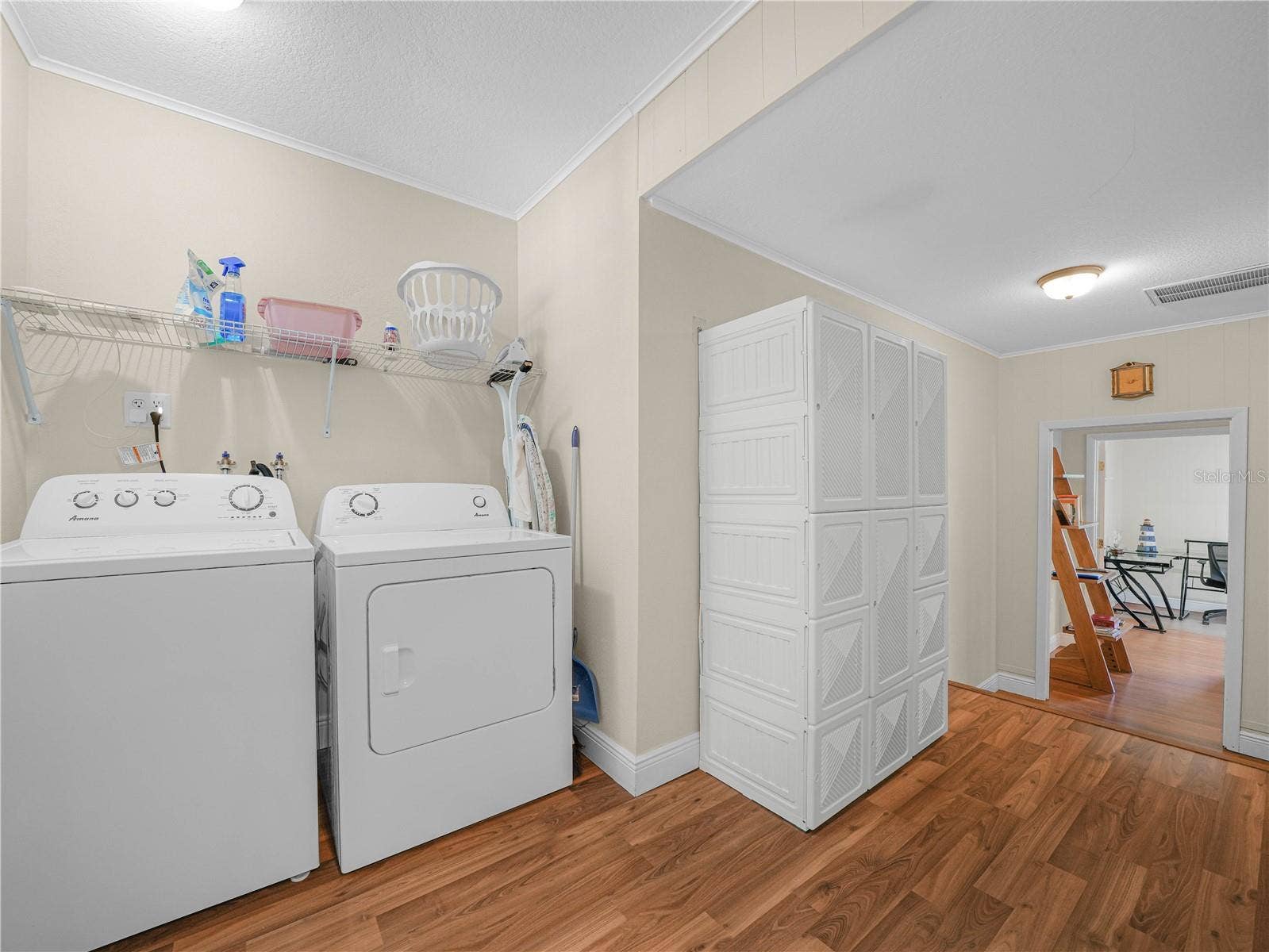 221 CITRUS GROVE BOULEVARD S, Polk City, FL 33868 Laundry Room and Closet Cove