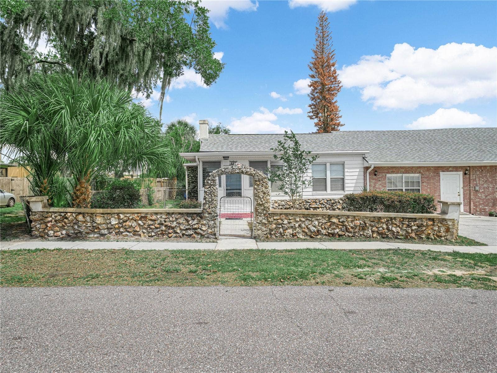 221 CITRUS GROVE BOULEVARD S, Polk City, FL 33868 Front of Cottage. Mother-in-law One.