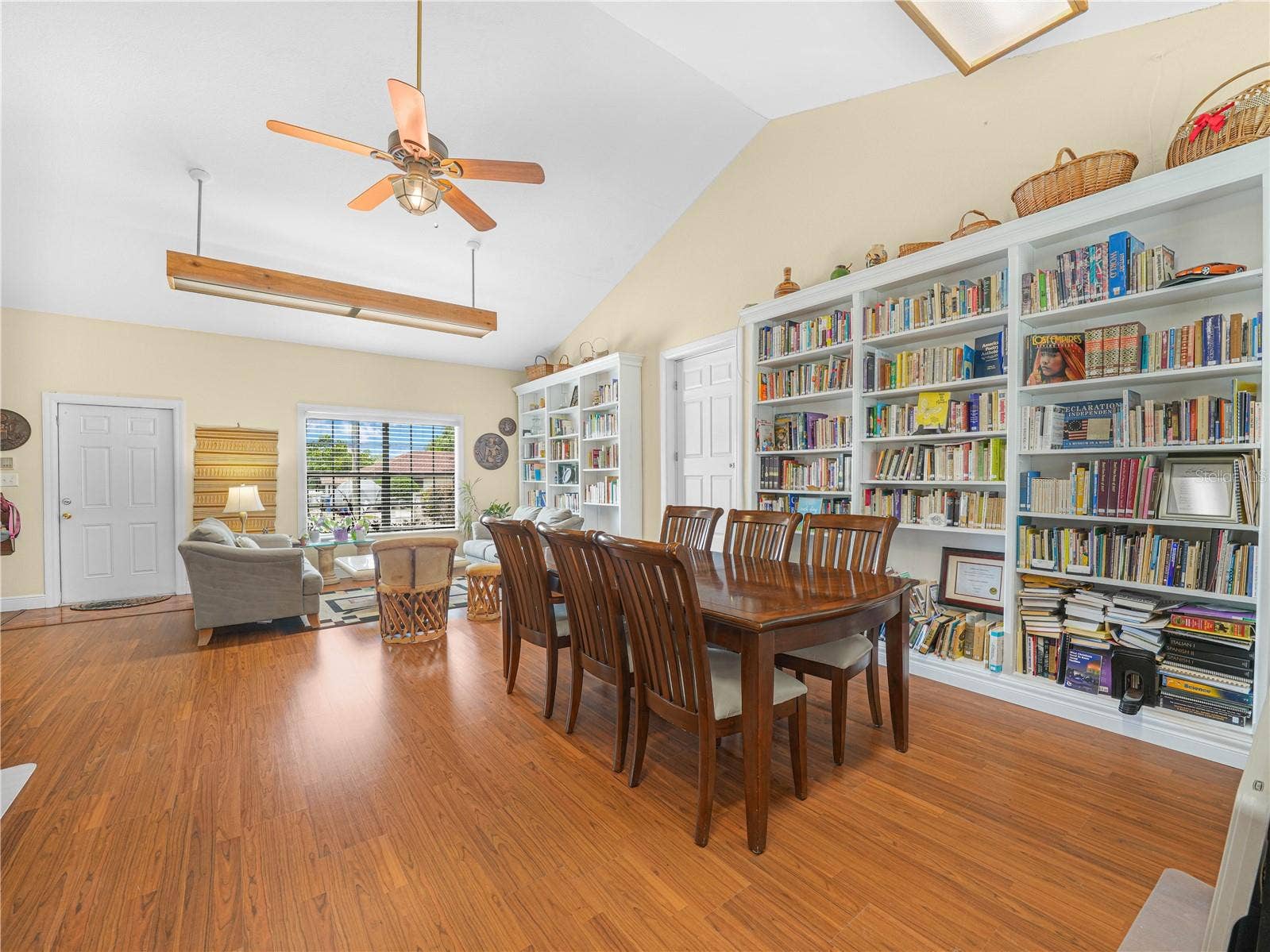 221 CITRUS GROVE BOULEVARD S, Polk City, FL 33868 Library with Door to Cottage