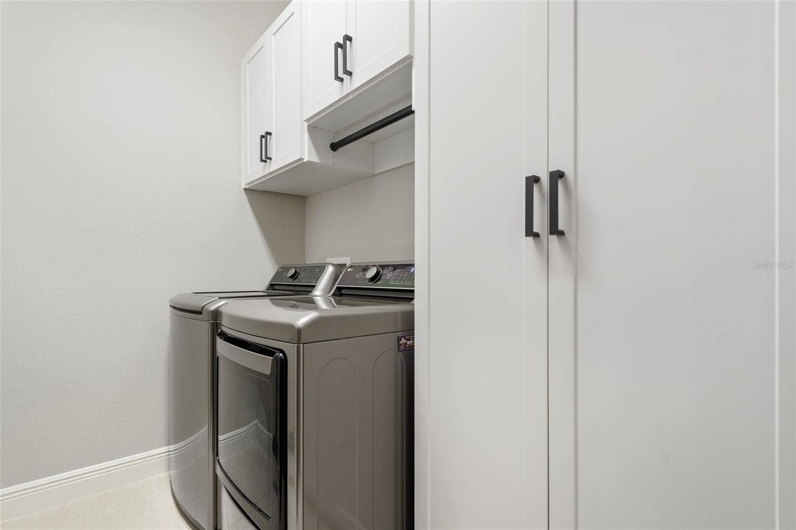 9230 YONATH STREET, Orlando, FL 32827 Custom Cabinet in Laundry