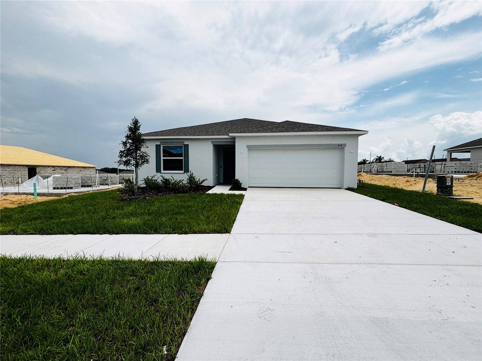 616 BROADOAK DRIVE, Dundee, FL 33838 Block Construction! Landscaping & Sidewalk!