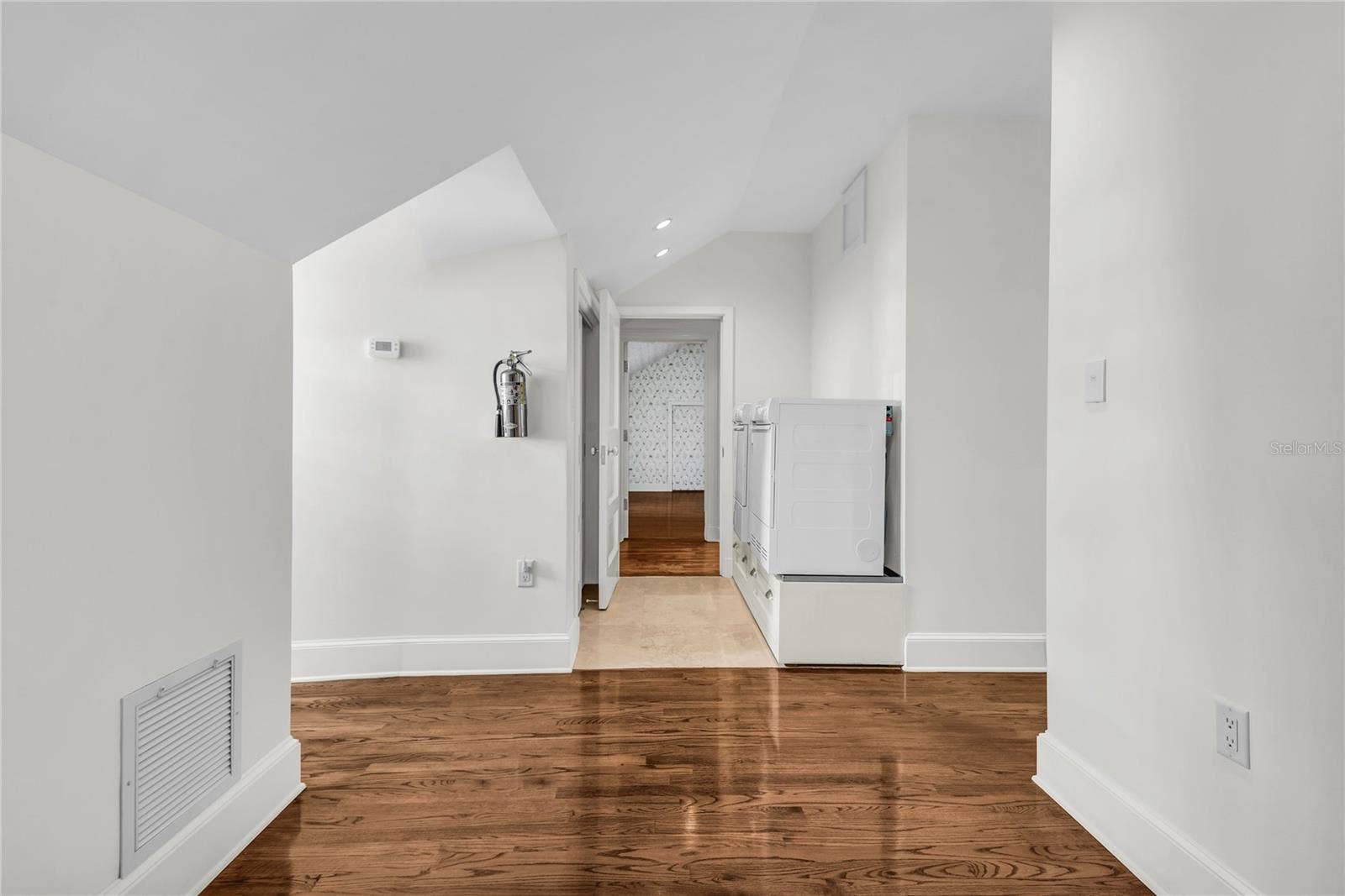 Original maid's quarters can be accessed off the primary suite or has an exterior entrance- includes bathroom and laundry