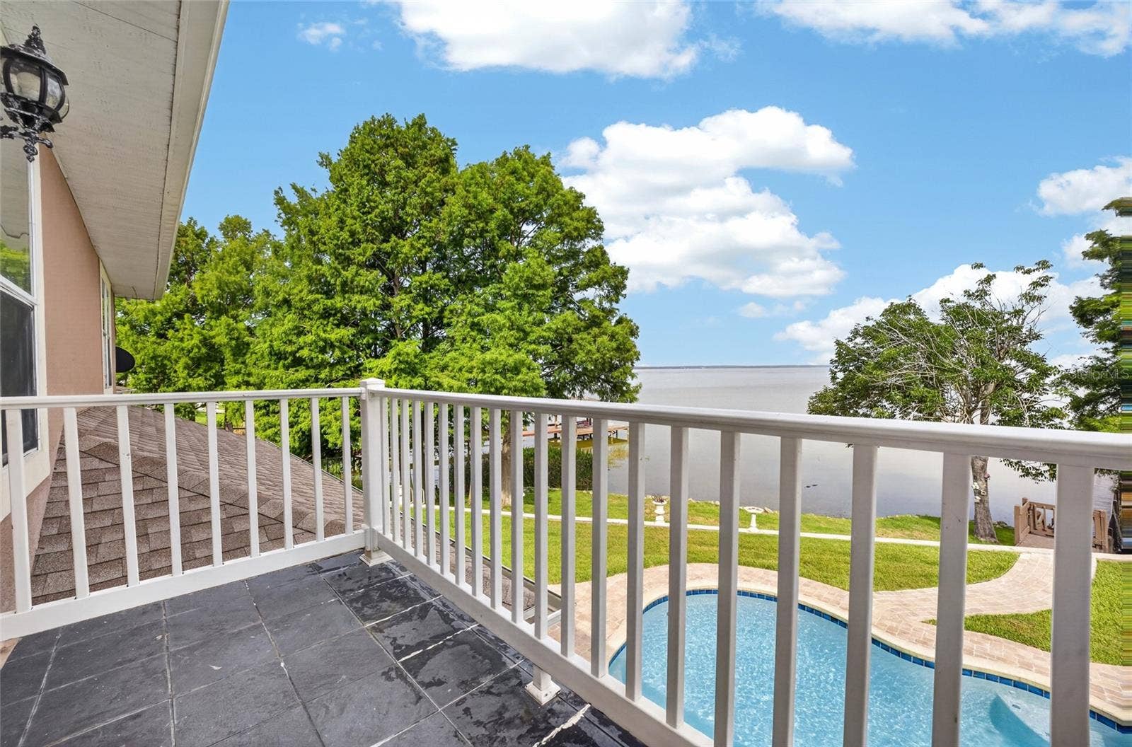 279 ZACHARY WADE STREET, Winter Garden, FL 34787 Balcony off the primary bedroom with lovely lake views
