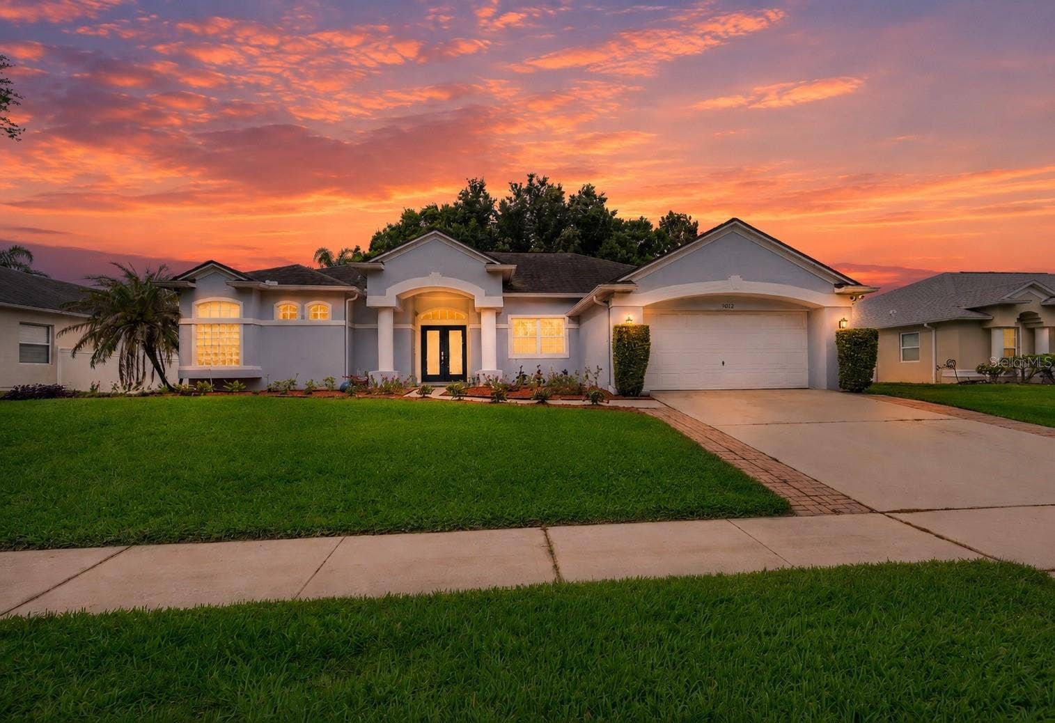 9012 LAKE FISCHER BOULEVARD, Gotha, FL 34734 Digitally enhanced twilight photo