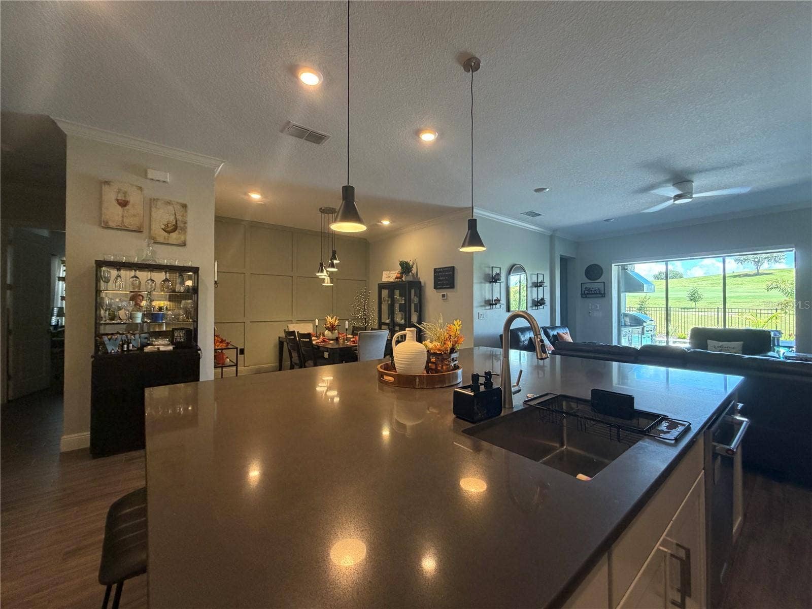 16136 VOLTERRA POINT, Bella Collina, FL 34756 Kitchen island with sink