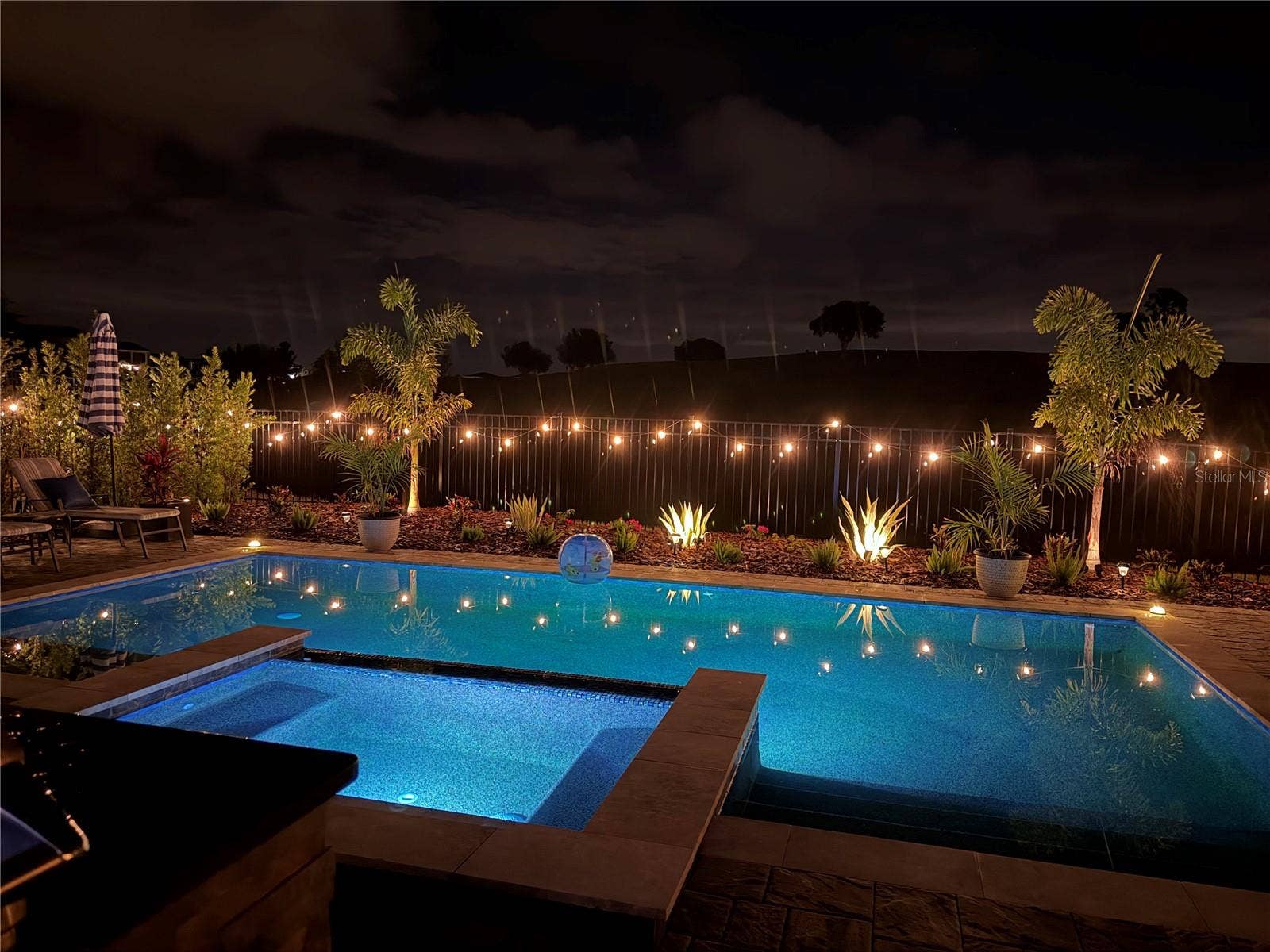 16136 VOLTERRA POINT, Bella Collina, FL 34756 Beautiful lighting around pool