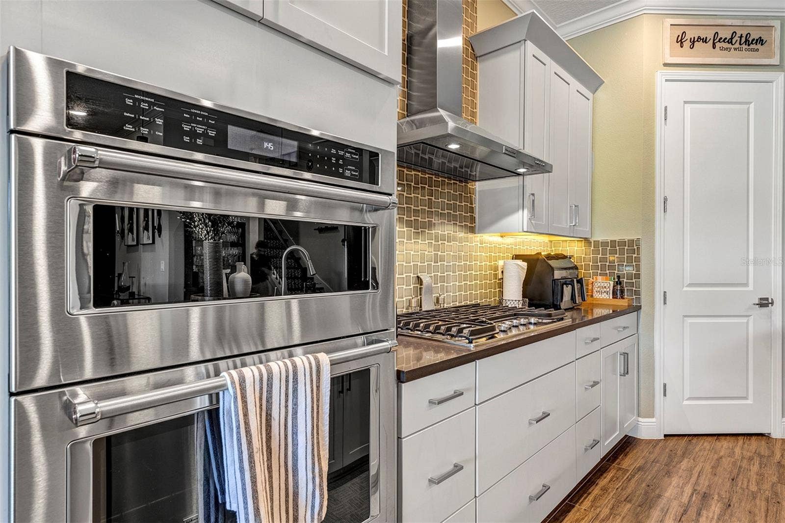 16136 VOLTERRA POINT, Bella Collina, FL 34756 KitchenAid Built in oven and microwave