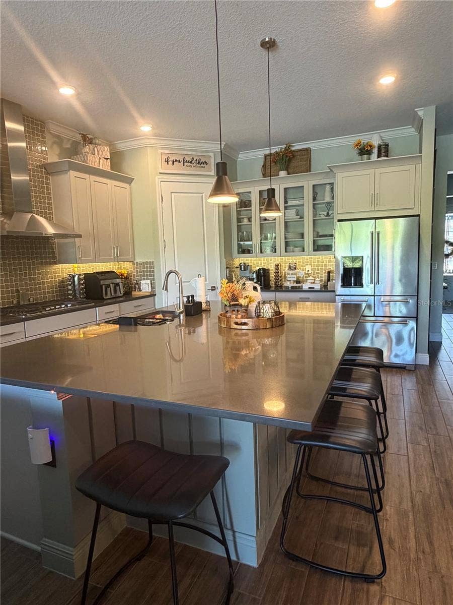 16136 VOLTERRA POINT, Bella Collina, FL 34756 Island