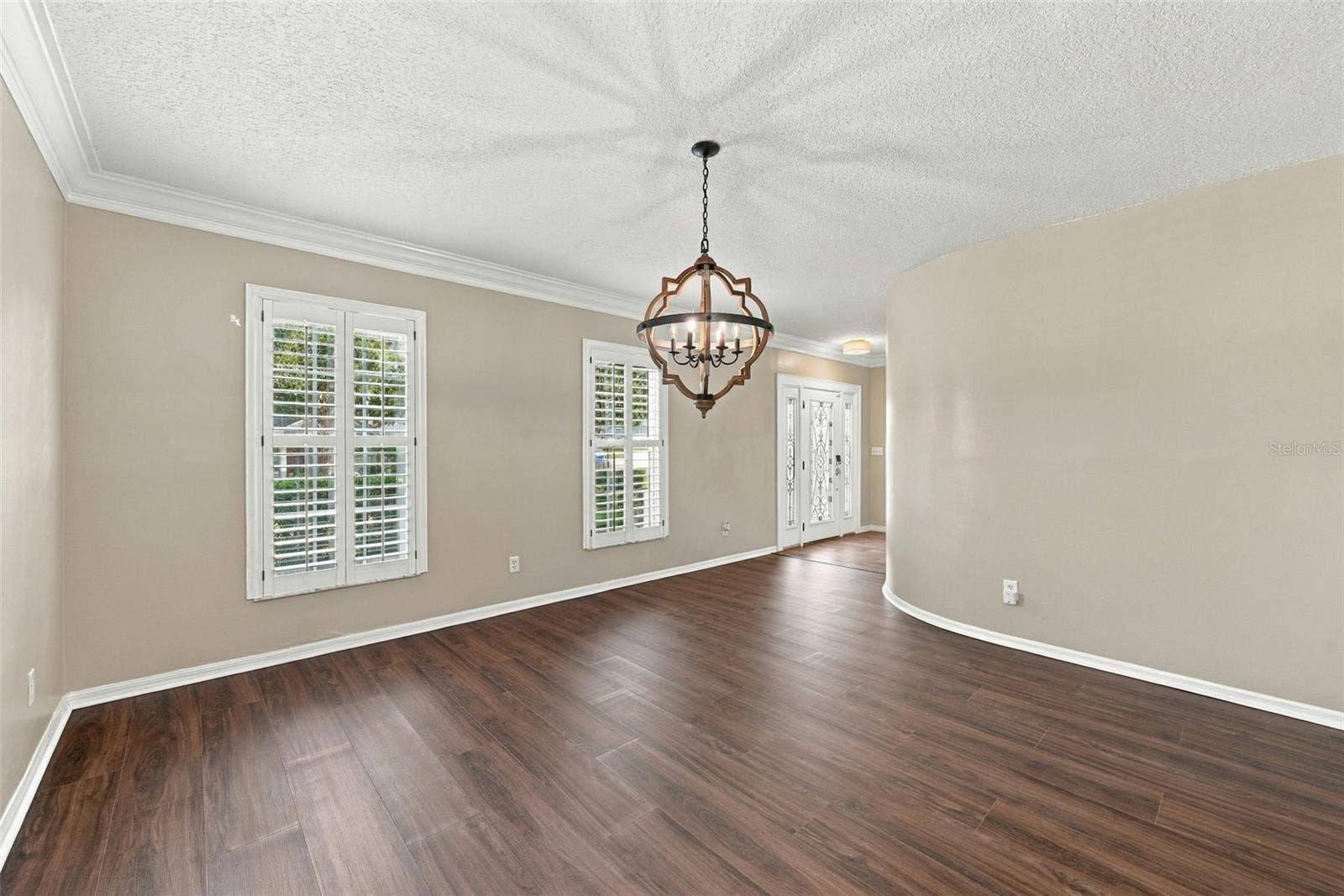 1349 VALLEY PINE CIRCLE, Apopka, FL 32712 Dining room with Brand New LVP Flooring and plantation shutters