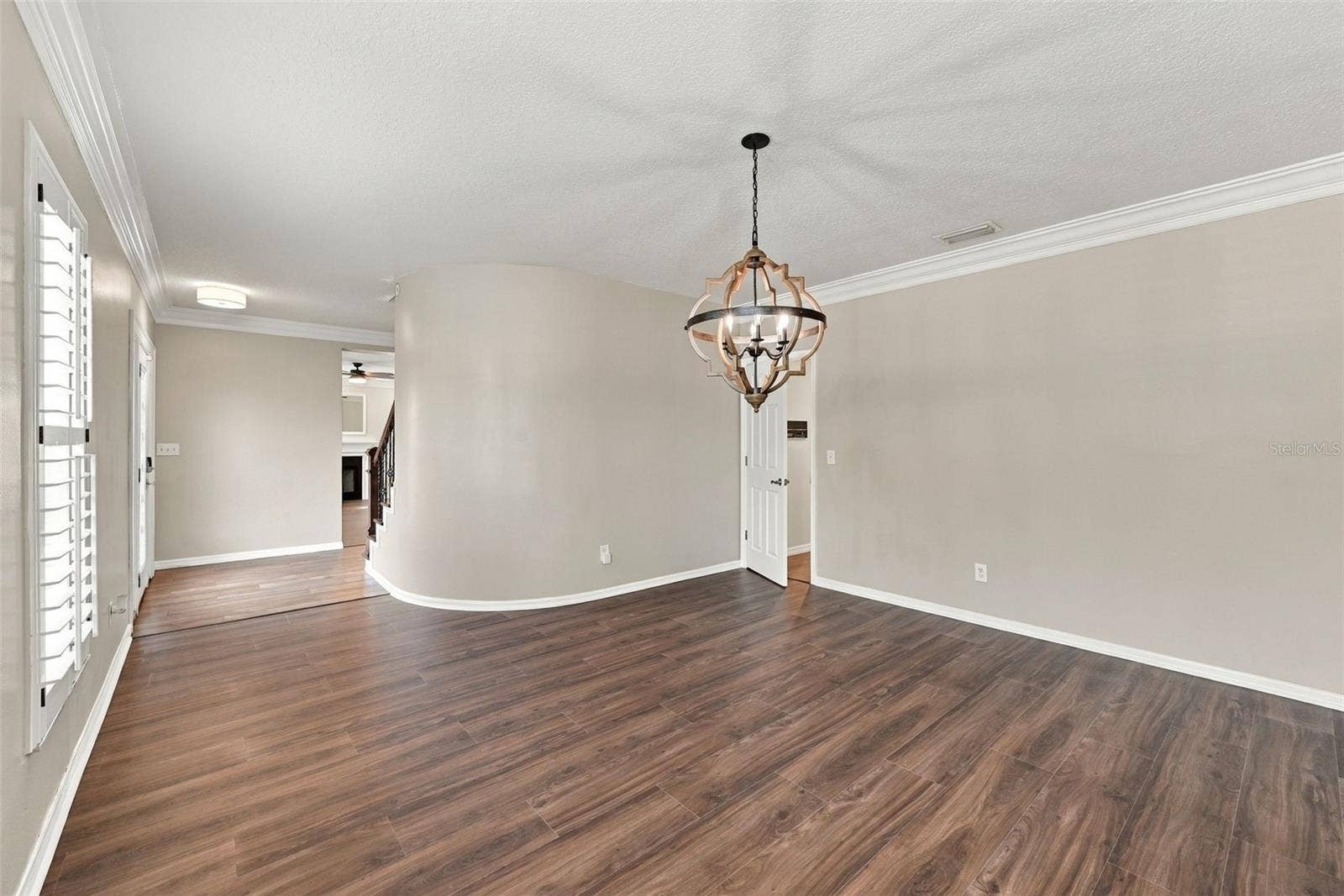 1349 VALLEY PINE CIRCLE, Apopka, FL 32712 Dining room with Brand New LVP Flooring and plantation shutters
