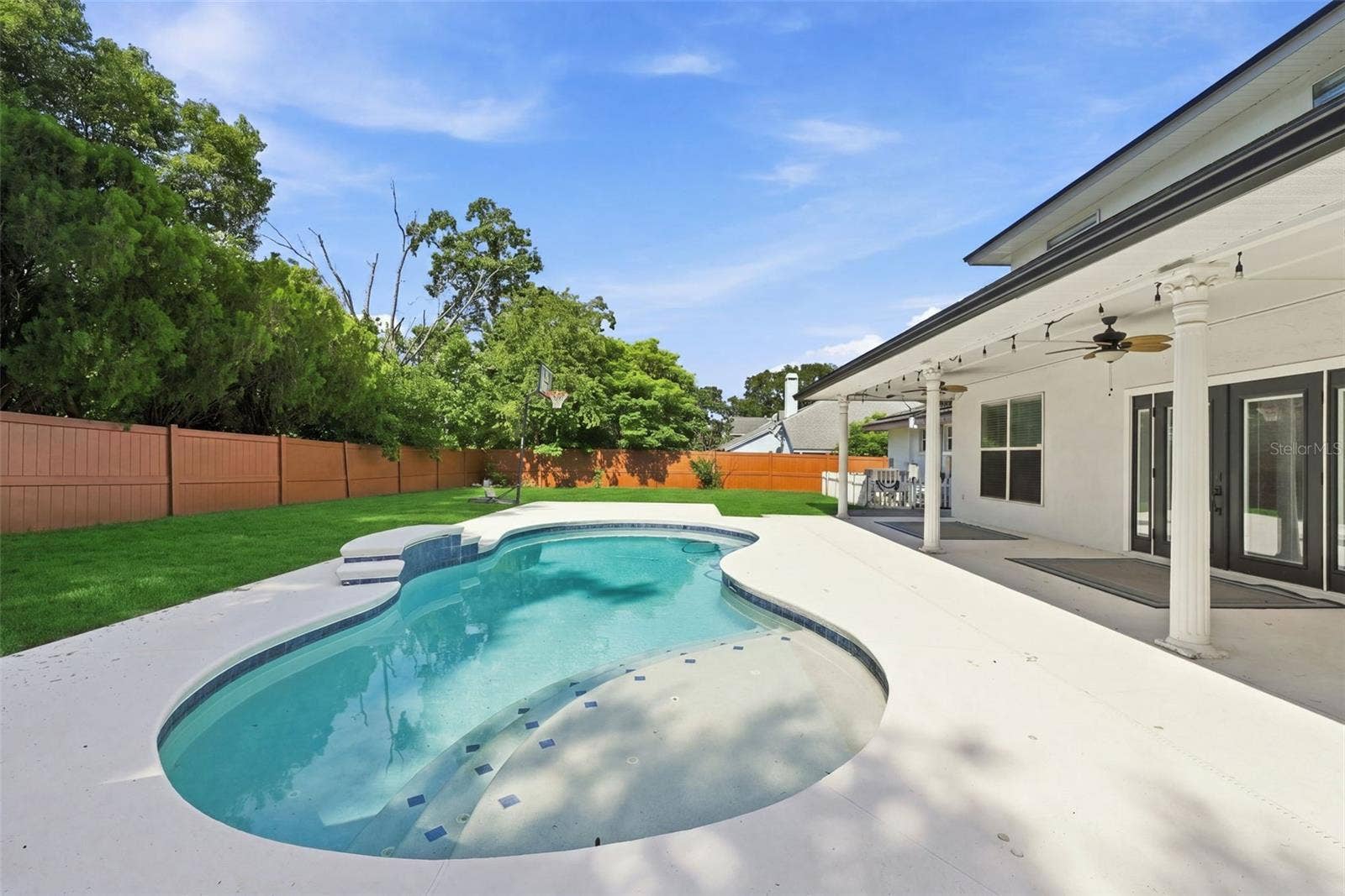 1349 VALLEY PINE CIRCLE, Apopka, FL 32712 Private Saltwater Pool & Outdoor Living! Enjoy Florida living with a solar-heated saltwater pool, expansive pool deck, and covered outdoor entertaining area.