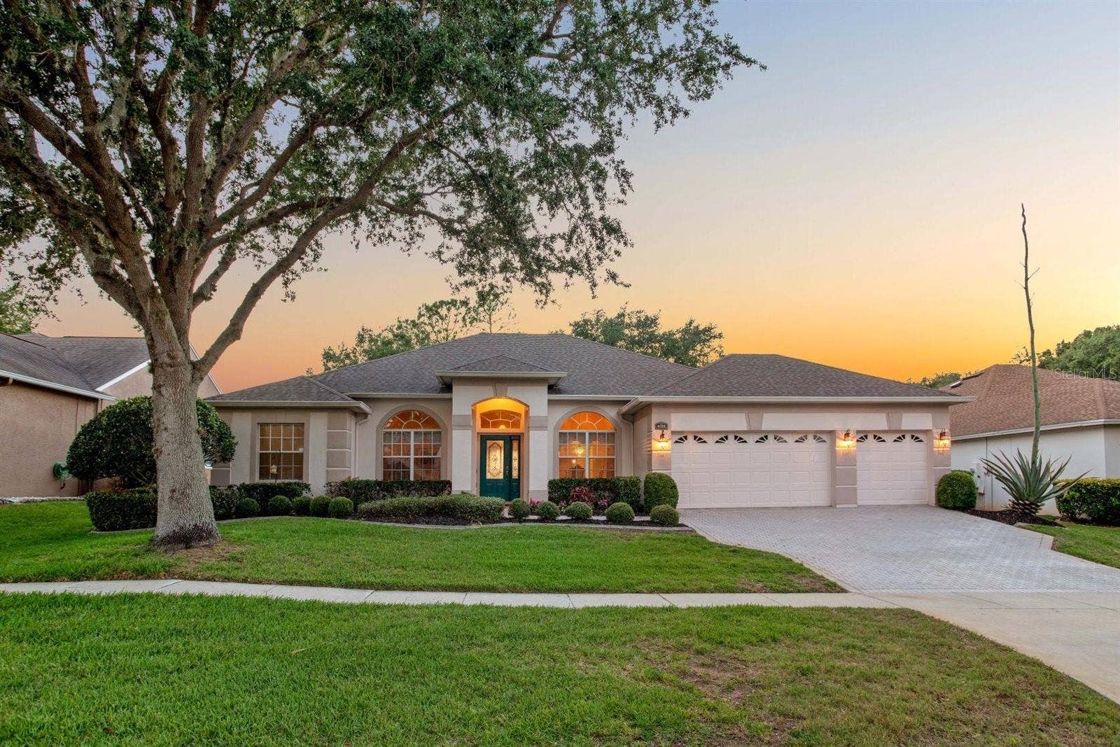 4328 FAWN MEADOWS CIRCLE, Clermont, FL 34711 Front Exterior at Dusk