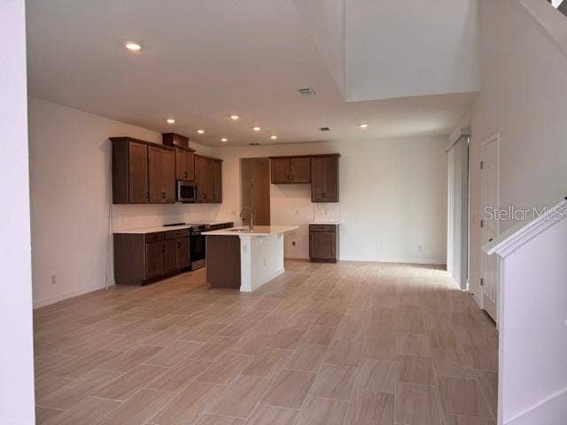 392 OAK FLAT ALLEY, Groveland, FL 34736 Great Room / Kitchen