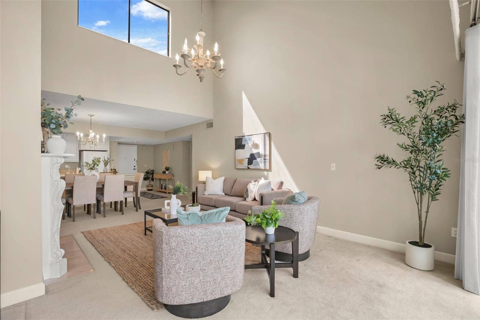 300 CAROLINA AVENUE, #402C, Winter Park, FL 32789 The top-floor location means natural light fills the large living room with additional windows along the vaulted ceiling!