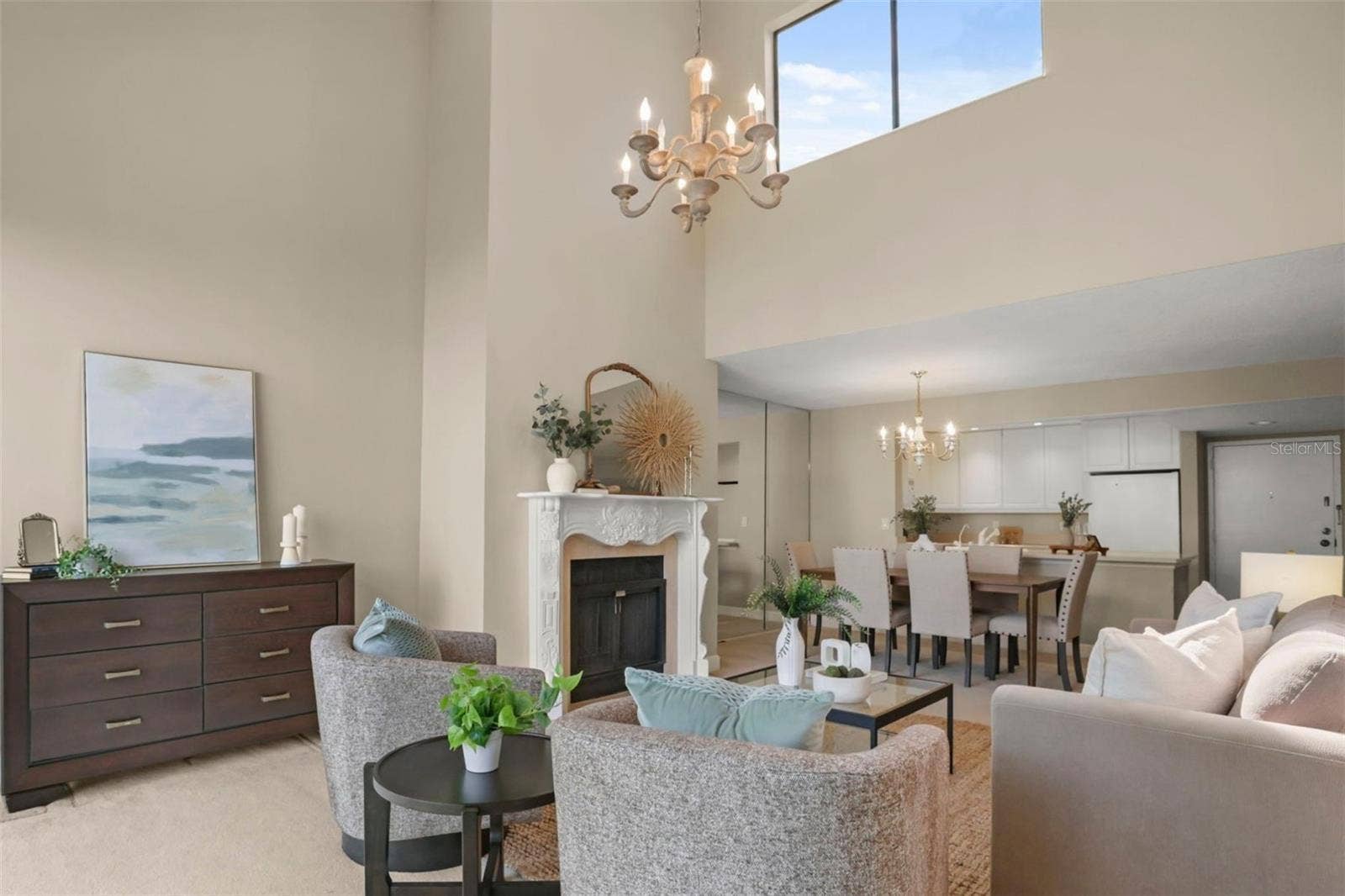 300 CAROLINA AVENUE, #402C, Winter Park, FL 32789 Great sightlines from the living room, dining room, and kitchen create an open feel that is ideal for entertaining.