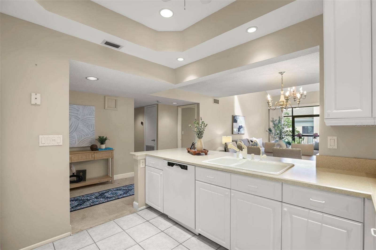 300 CAROLINA AVENUE, #402C, Winter Park, FL 32789 Like so many homeowners desire, this kitchen is open to living areas to create an inviting flow.