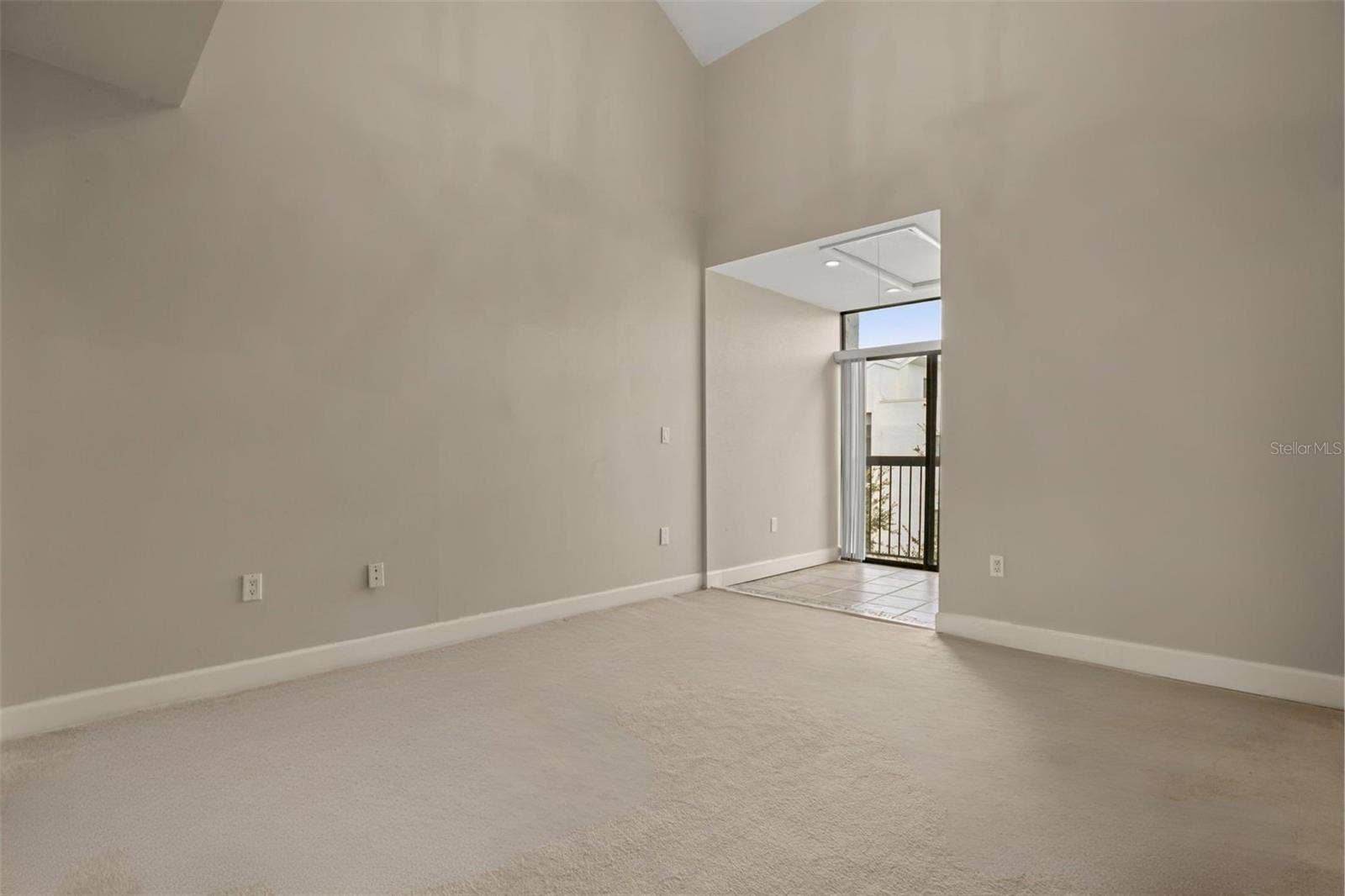 300 CAROLINA AVENUE, #402C, Winter Park, FL 32789 The 2nd bedroom includes its own sunroom with a Juliette balcony and vaulted ceilings to add to the openness. To make maximum use of the vaulted ceilings, an attic storage space was added over the sunroom with approximately 85 square feet of storage space, including shelving and electricity.