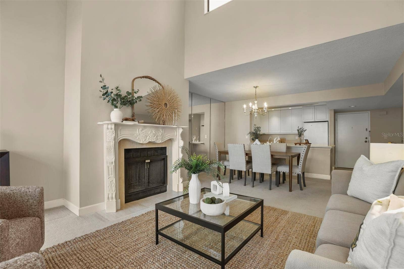 300 CAROLINA AVENUE, #402C, Winter Park, FL 32789 The living room is anchored by a gorgeously framed fireplace, a hard-to-find amenity in a condo home!