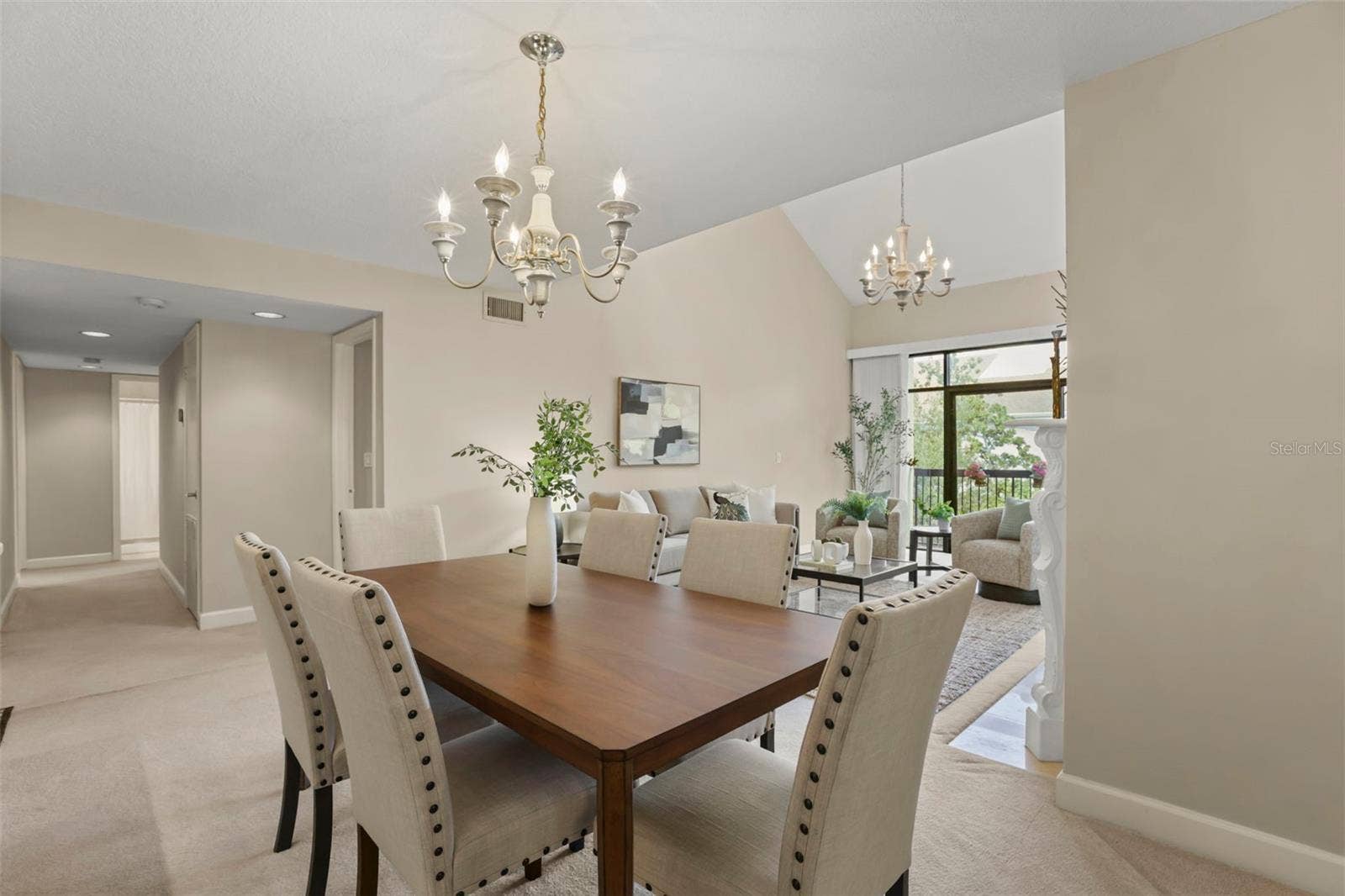 300 CAROLINA AVENUE, #402C, Winter Park, FL 32789 Perfect for both quiet dinners at home or large parties, the dining room seamlessly leads to the living room.