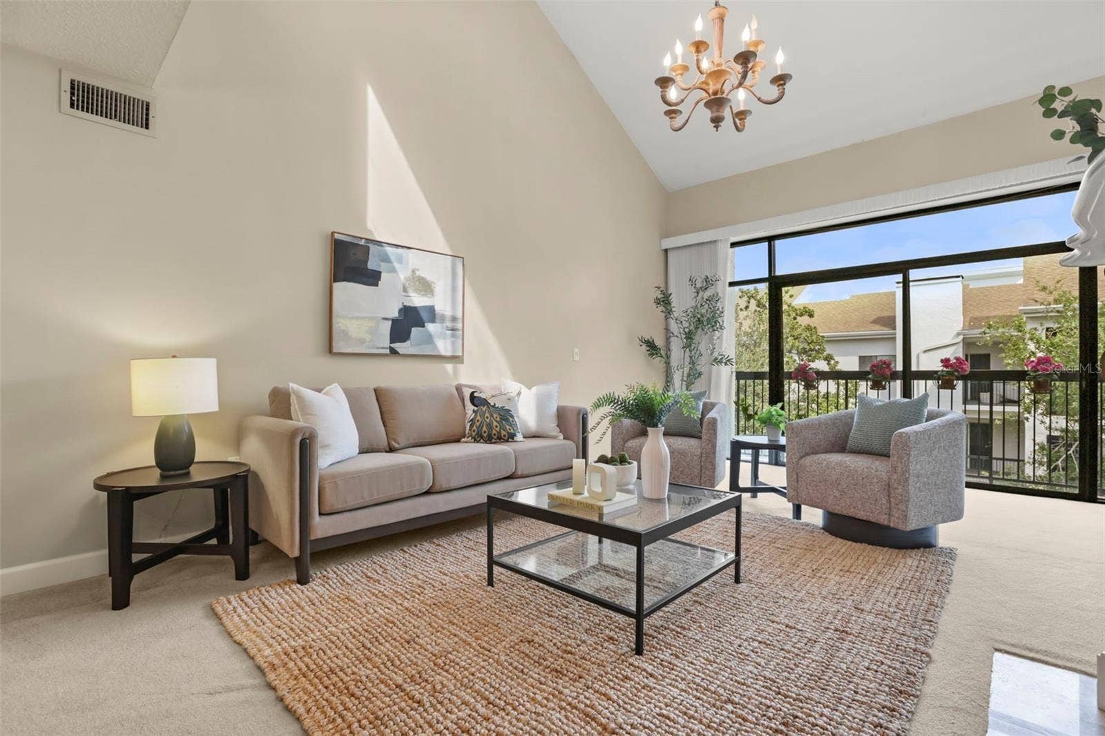 300 CAROLINA AVENUE, #402C, Winter Park, FL 32789 Stress-free condo living doesn't mean smaller space in this spectacular home. The living room is open, bright, and spacious!
