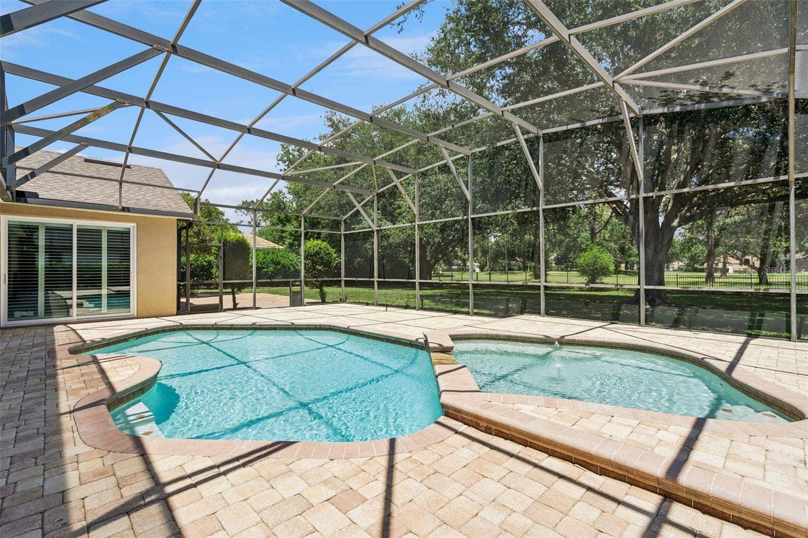 SCREENED POOL AND WATER FEATURE