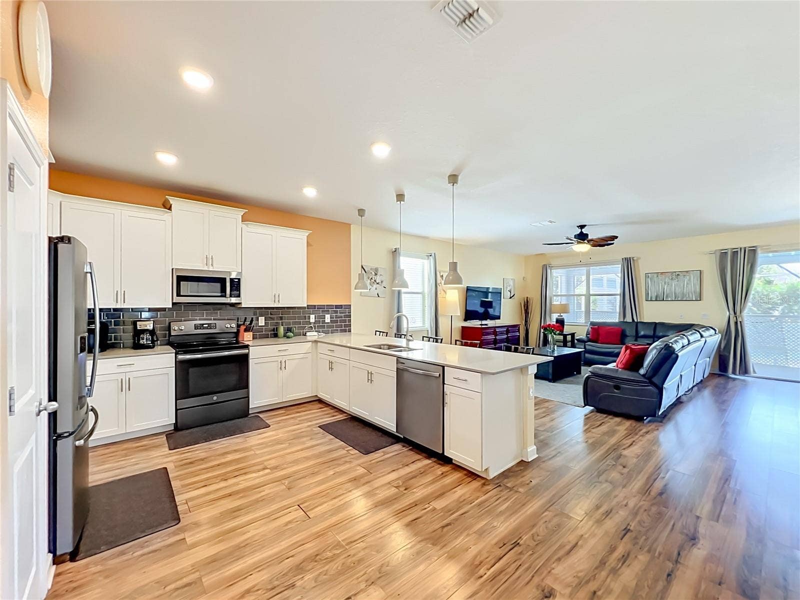 1573 MAIDSTONE COURT, Davenport, FL 33896 kitchen - living room