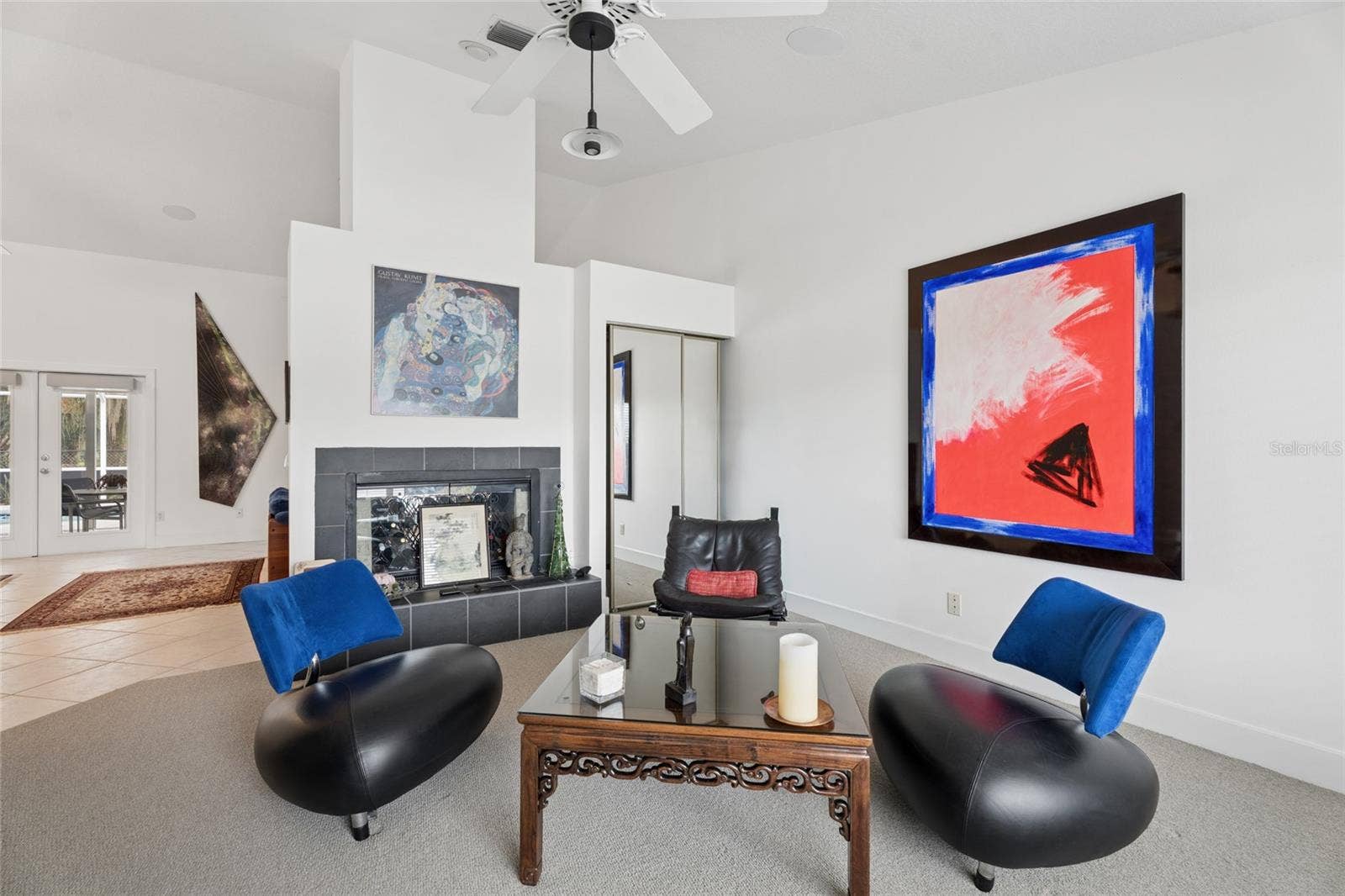 4404 SIMMONS ROAD, Orlando, FL 32812 Living Room with a Fireplace