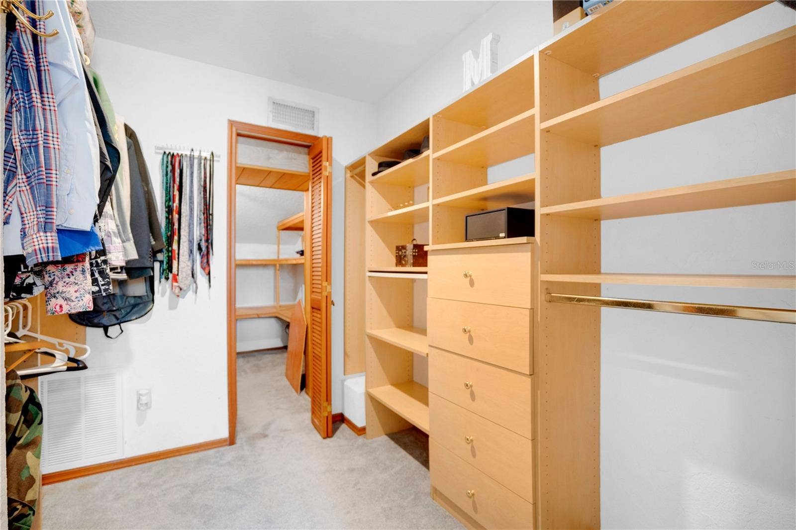 1367 CAMPBELL STREET, Orlando, FL 32806 The second primary closet with extended storage at the rear