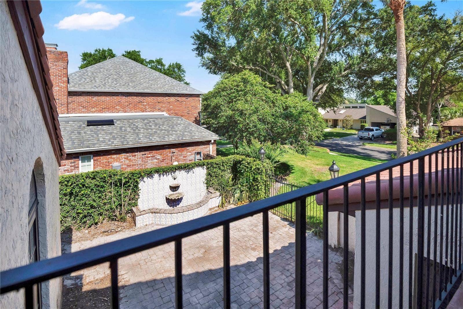 1367 CAMPBELL STREET, Orlando, FL 32806 A view of the 'main courtyard' from the primary balcony - how many homes can say that?