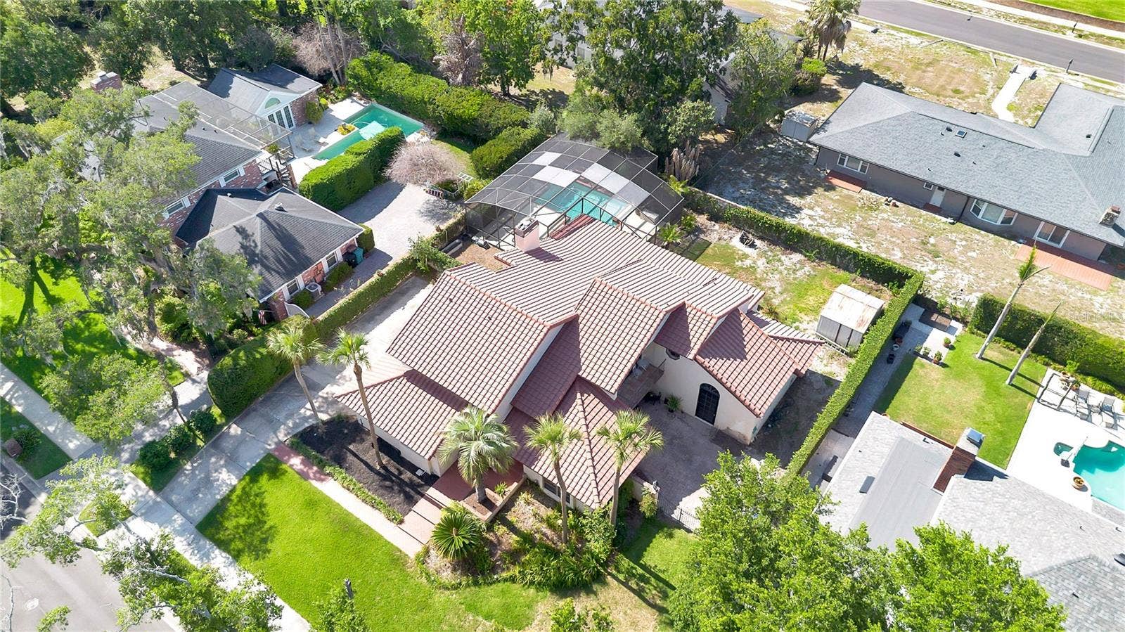1367 CAMPBELL STREET, Orlando, FL 32806 The backyard is fully enclosed by a block wall and secured with wrought iron gates.