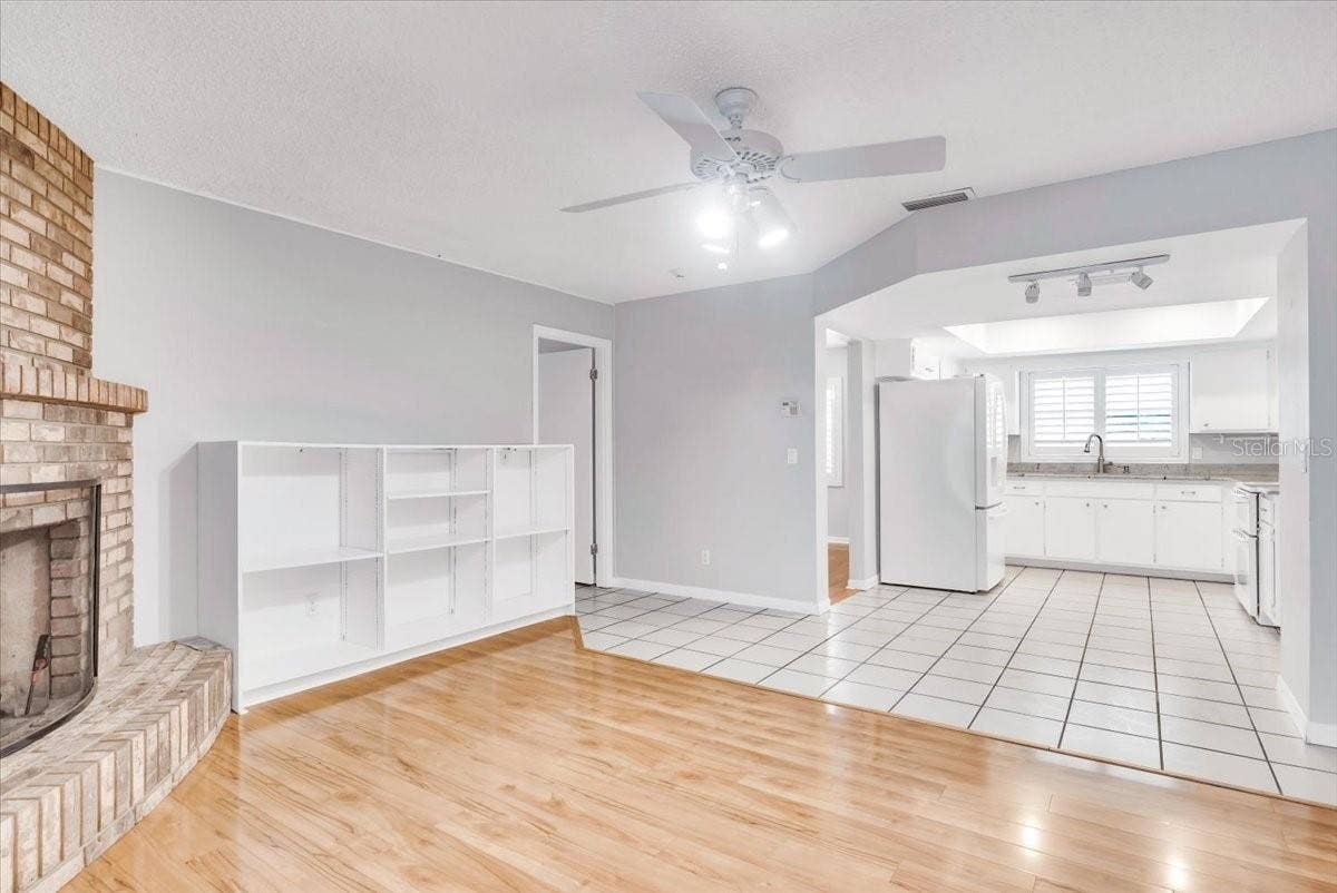 715 S RANGER BOULEVARD, Winter Park, FL 32792 Living area to kitchen.