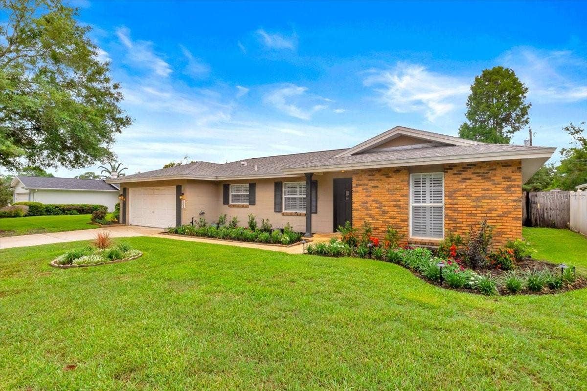 715 S RANGER BOULEVARD, Winter Park, FL 32792 Fresh landscaping provides plenty of curb appeal.